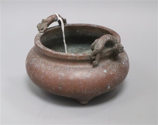 A Chinese bronze tripod censer